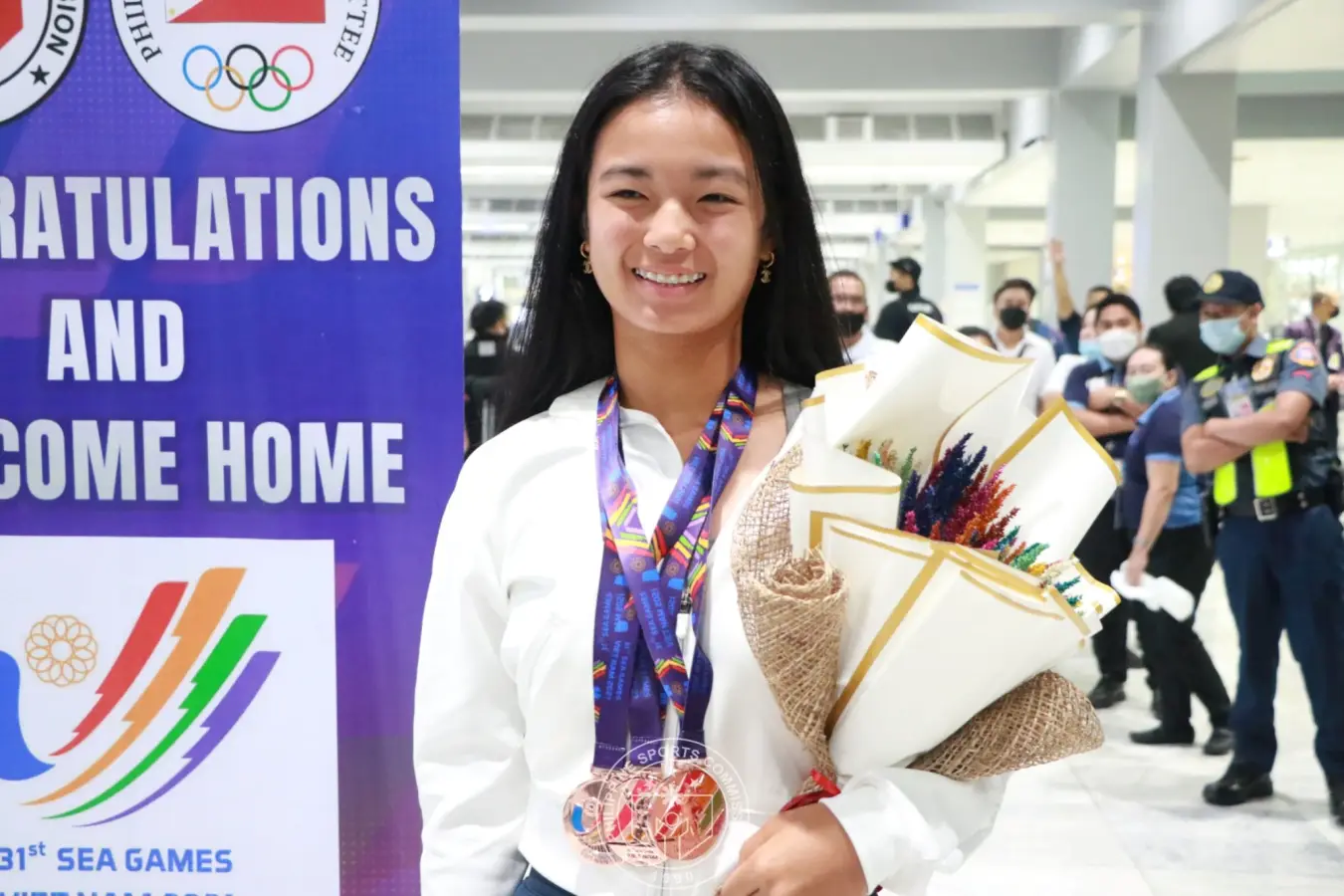 Alexandra Eala with her SEA Games medals