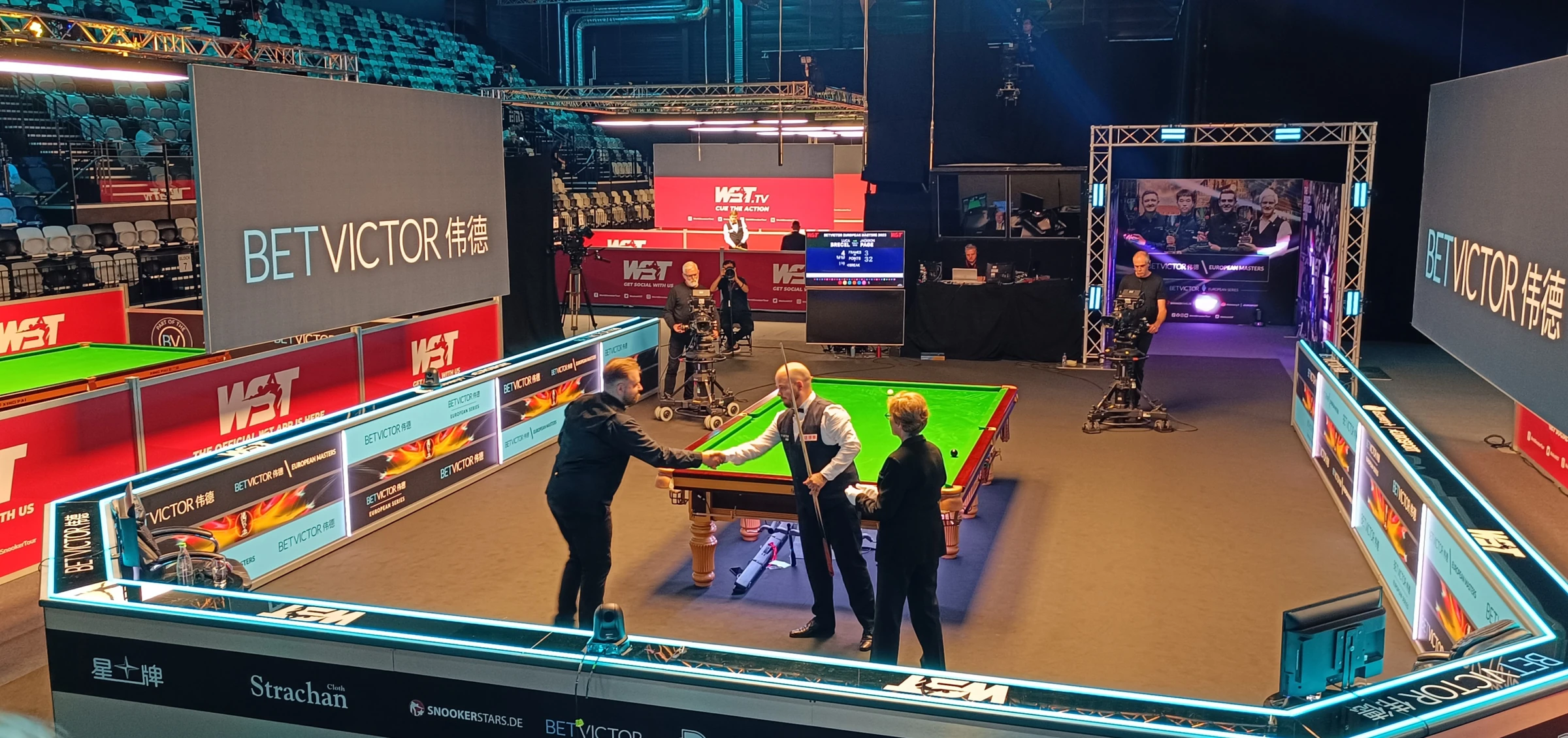 Luca Brecel and Jackson Page at a snooker event