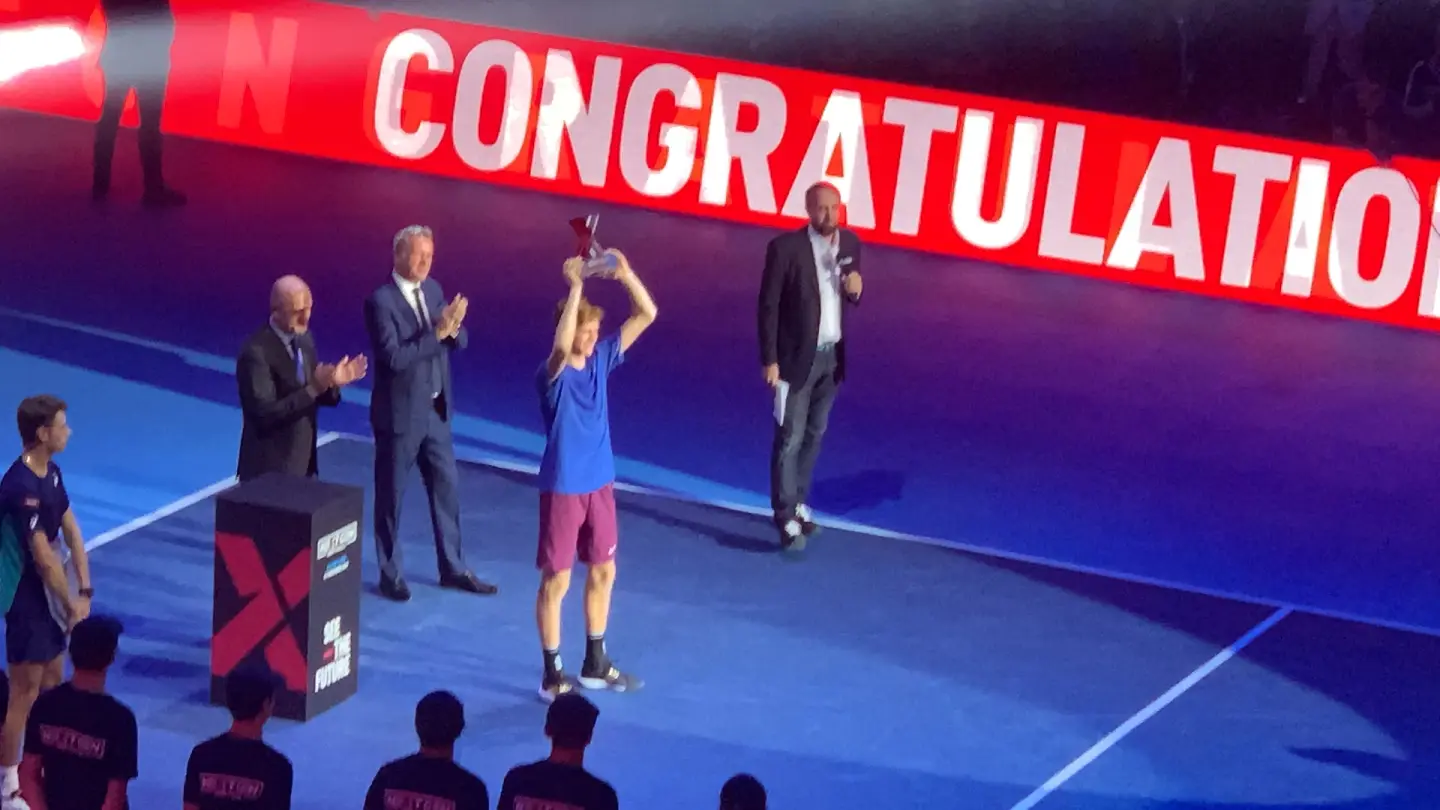 Jannik Sinner celebrates a tennis title