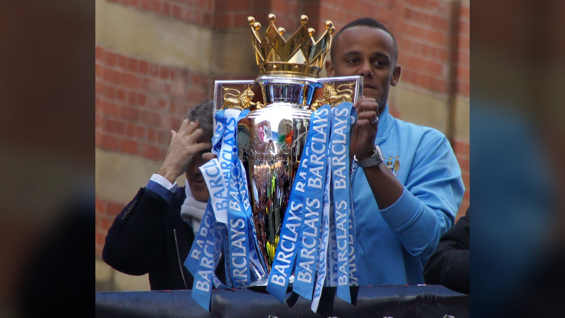 Manchester City lift the Premier League trophy