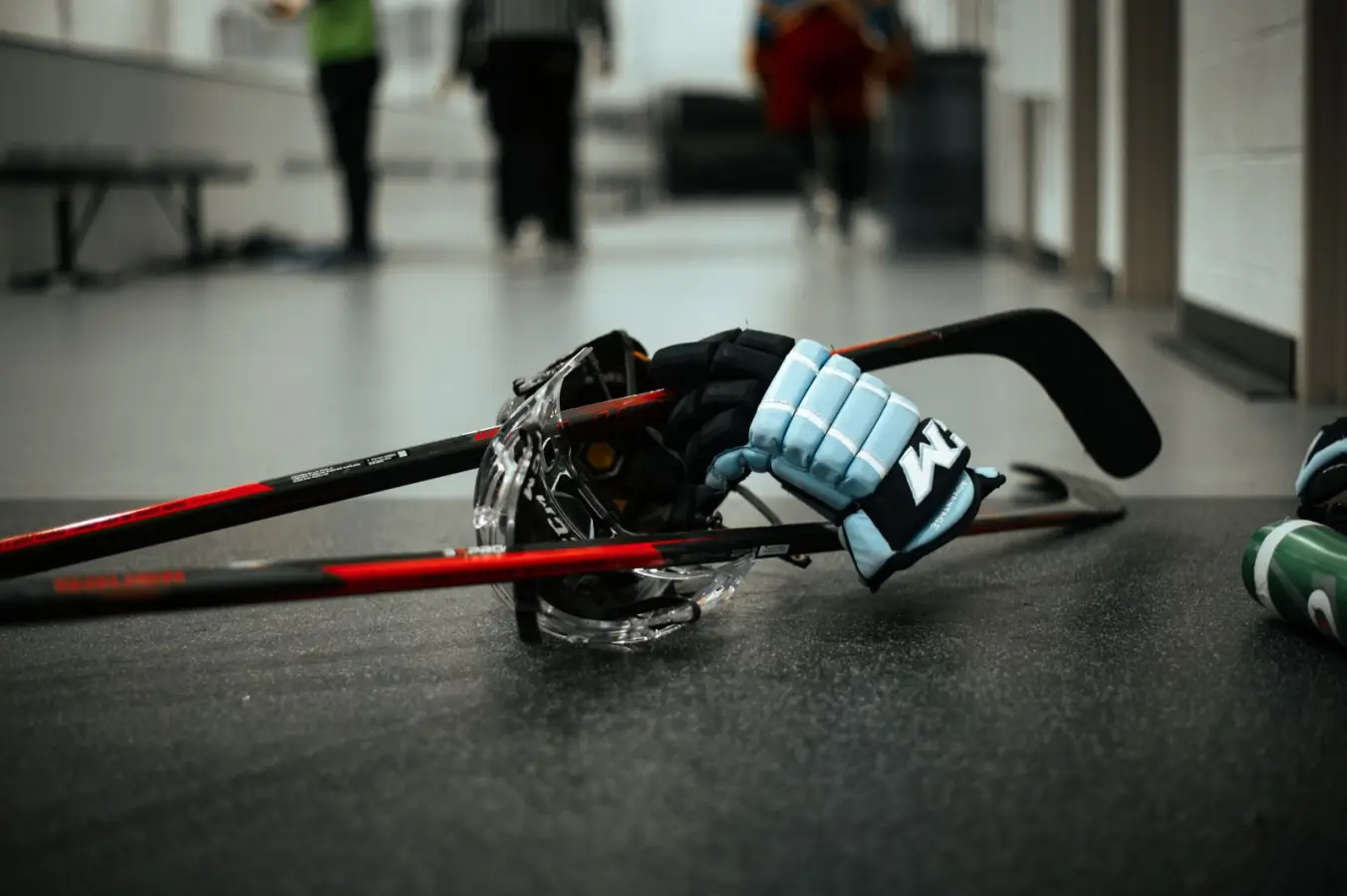 Ice hockey sticks, helmet and gloves; illustrative photograph