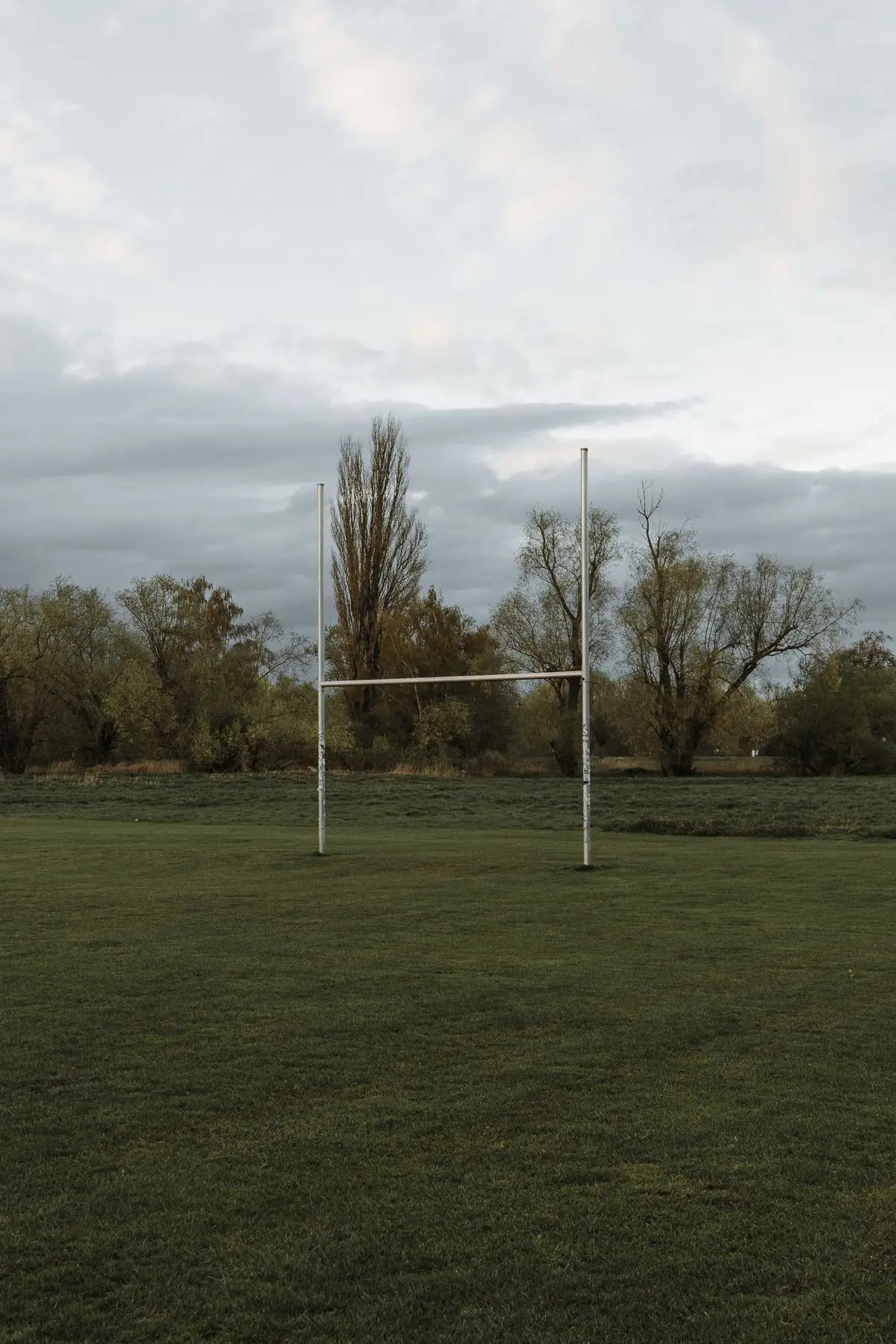 Rugby goalposts on a grass pitch