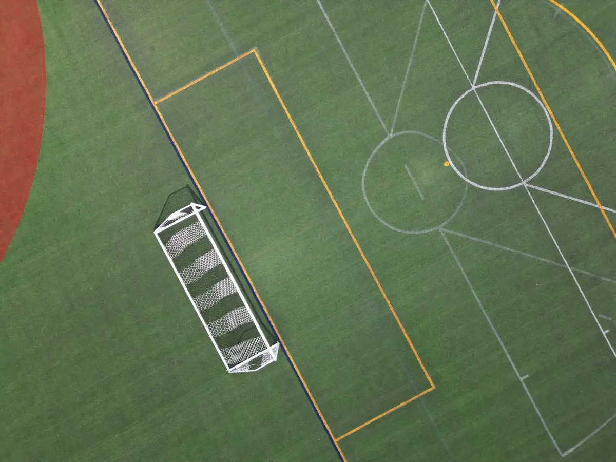 Aerial view of football goal and pitch markings