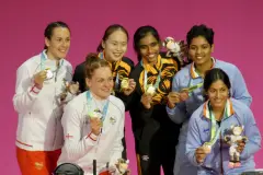 Pearly Tan and Thinaah seal Asian Games medal