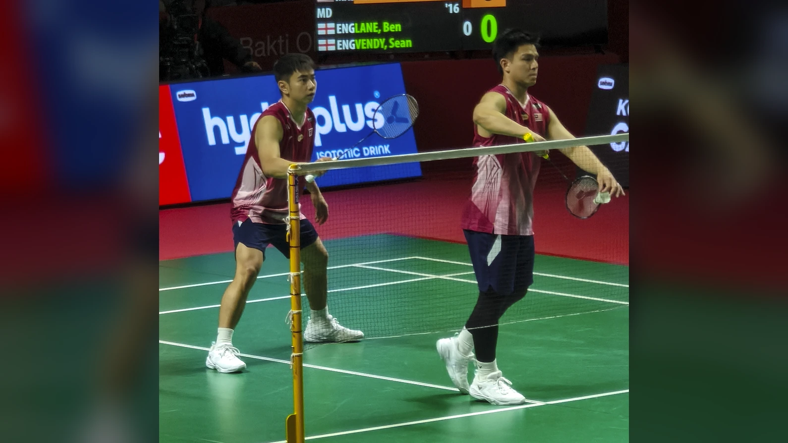 Goh Sze Fei and Nur Izzuddin playing doubles