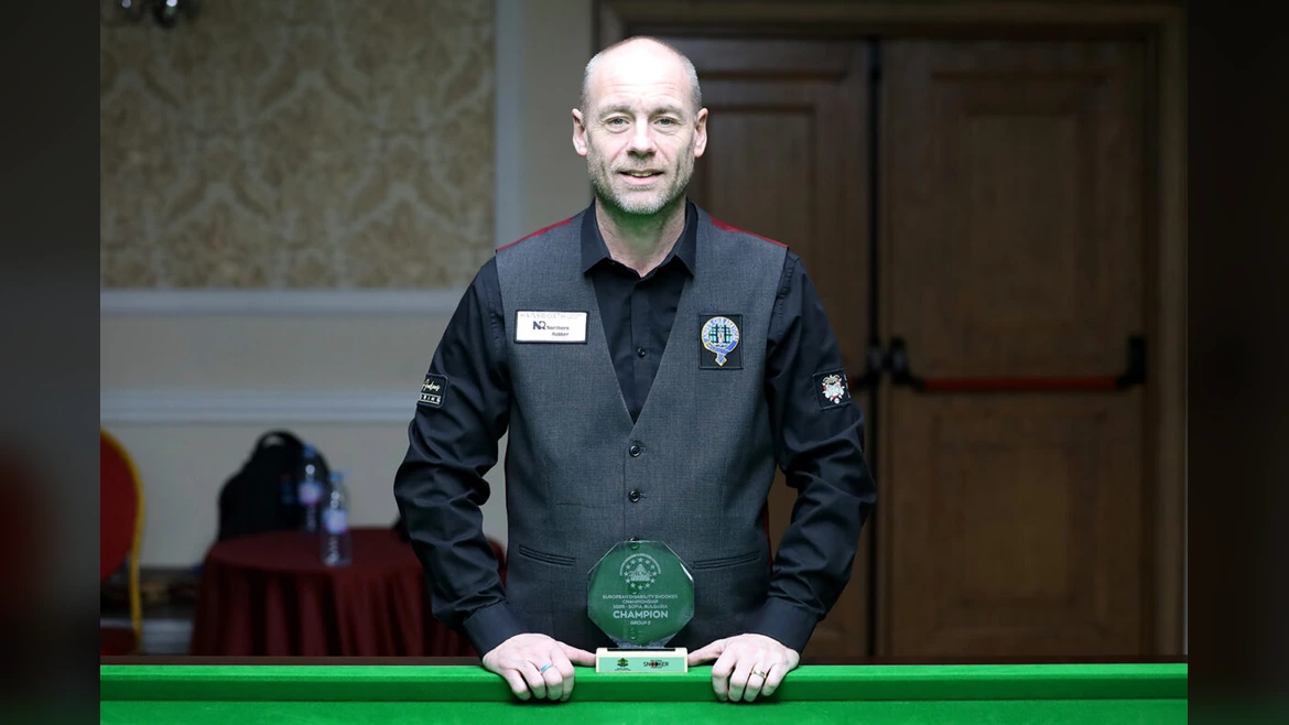 Dylan Rees celebrates his European disability snooker title