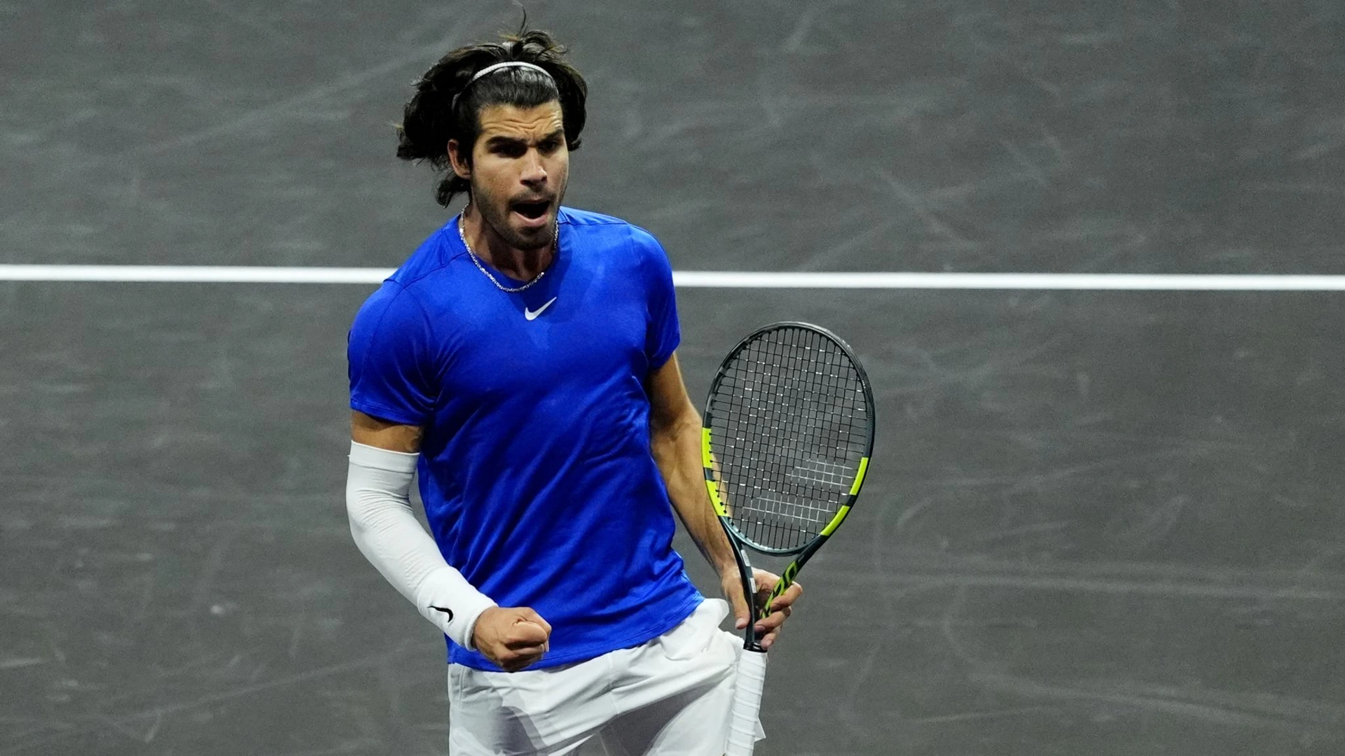 Carlos Alcaraz in action against Taylor Fritz at the Laver Cup