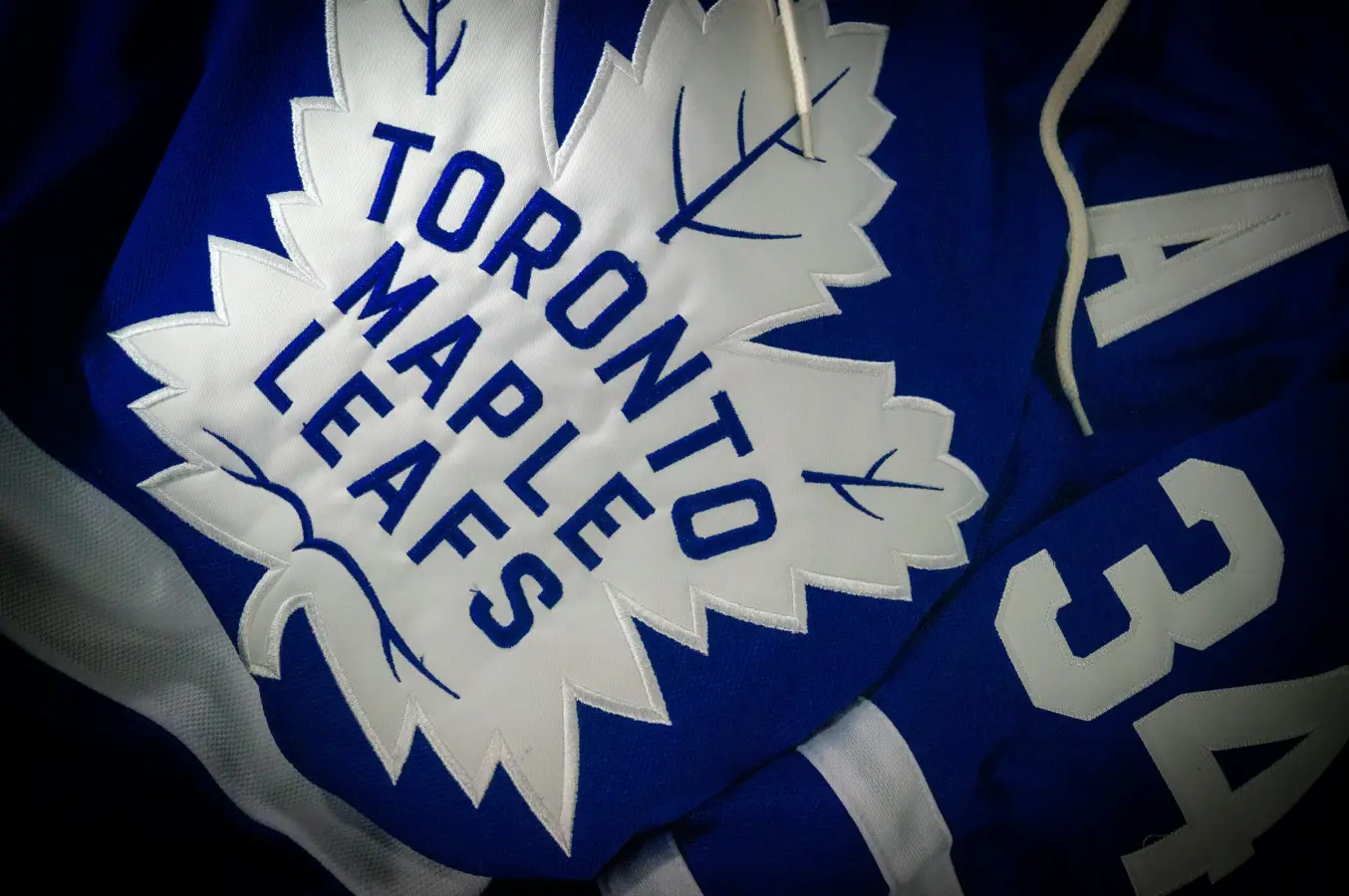 Toronto Maple Leafs jersey; contextual image, not Kirill Marchenko