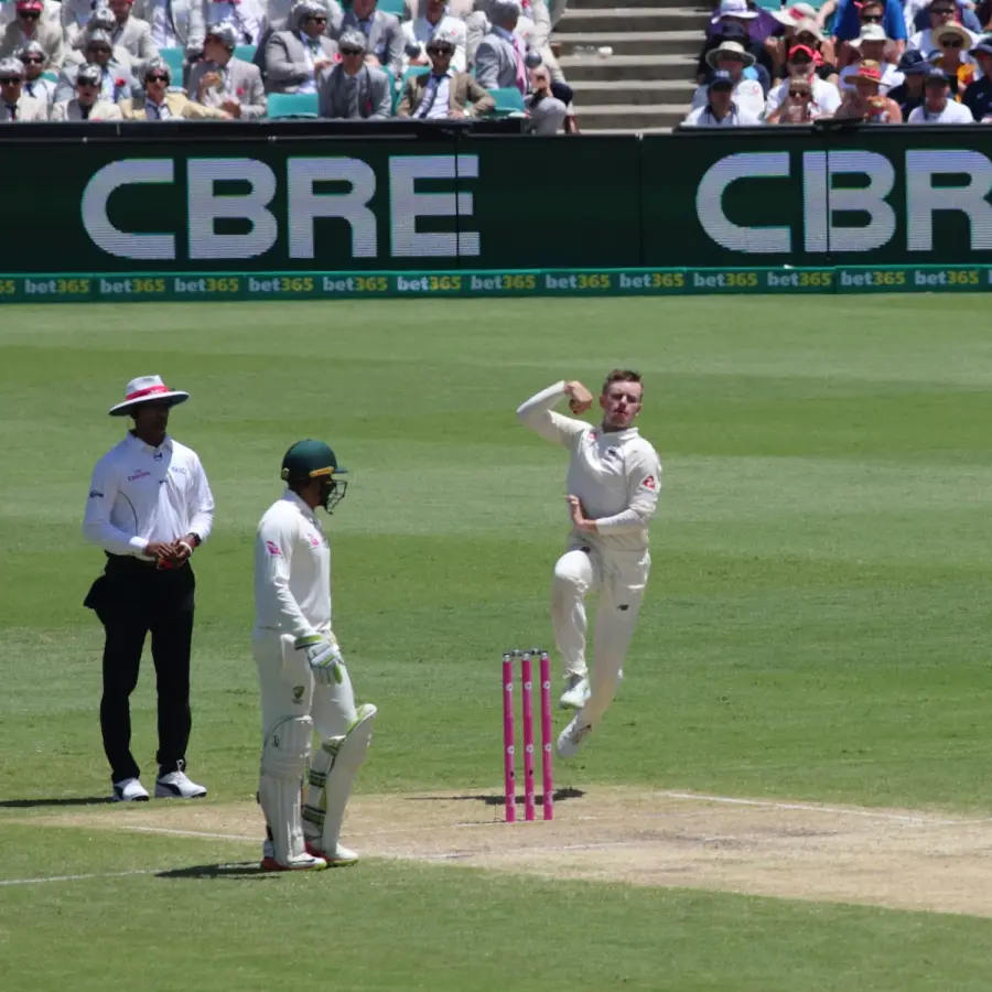 Mason Crane bowling for England during his Test debut in Sydney