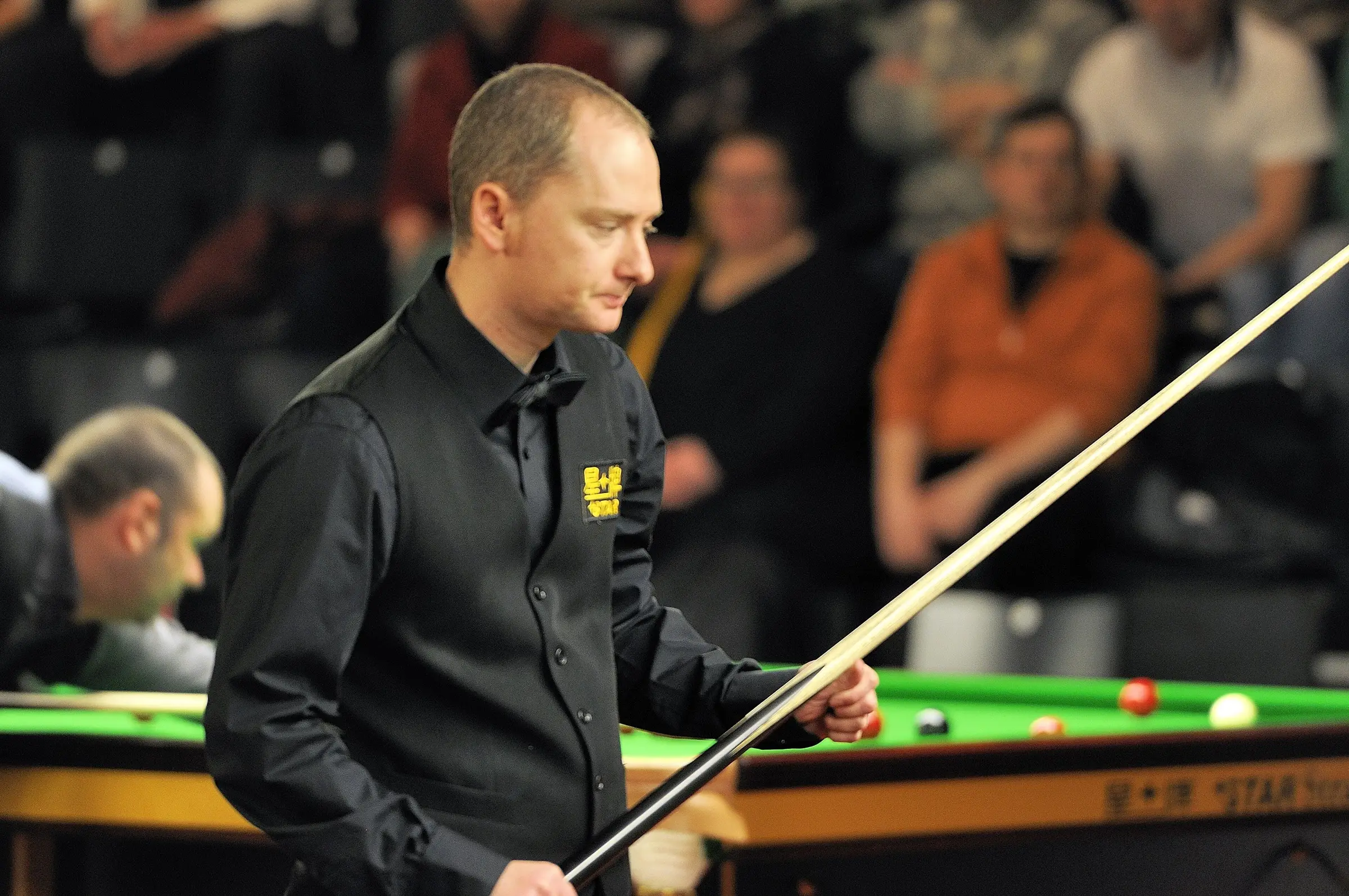 Graeme Dott at the snooker table during the 2014 German Masters