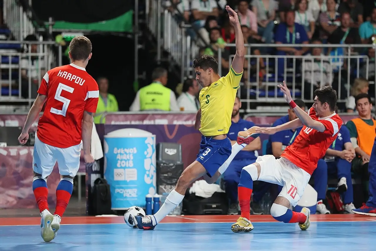 Brazil players competing in an international youth futsal match
