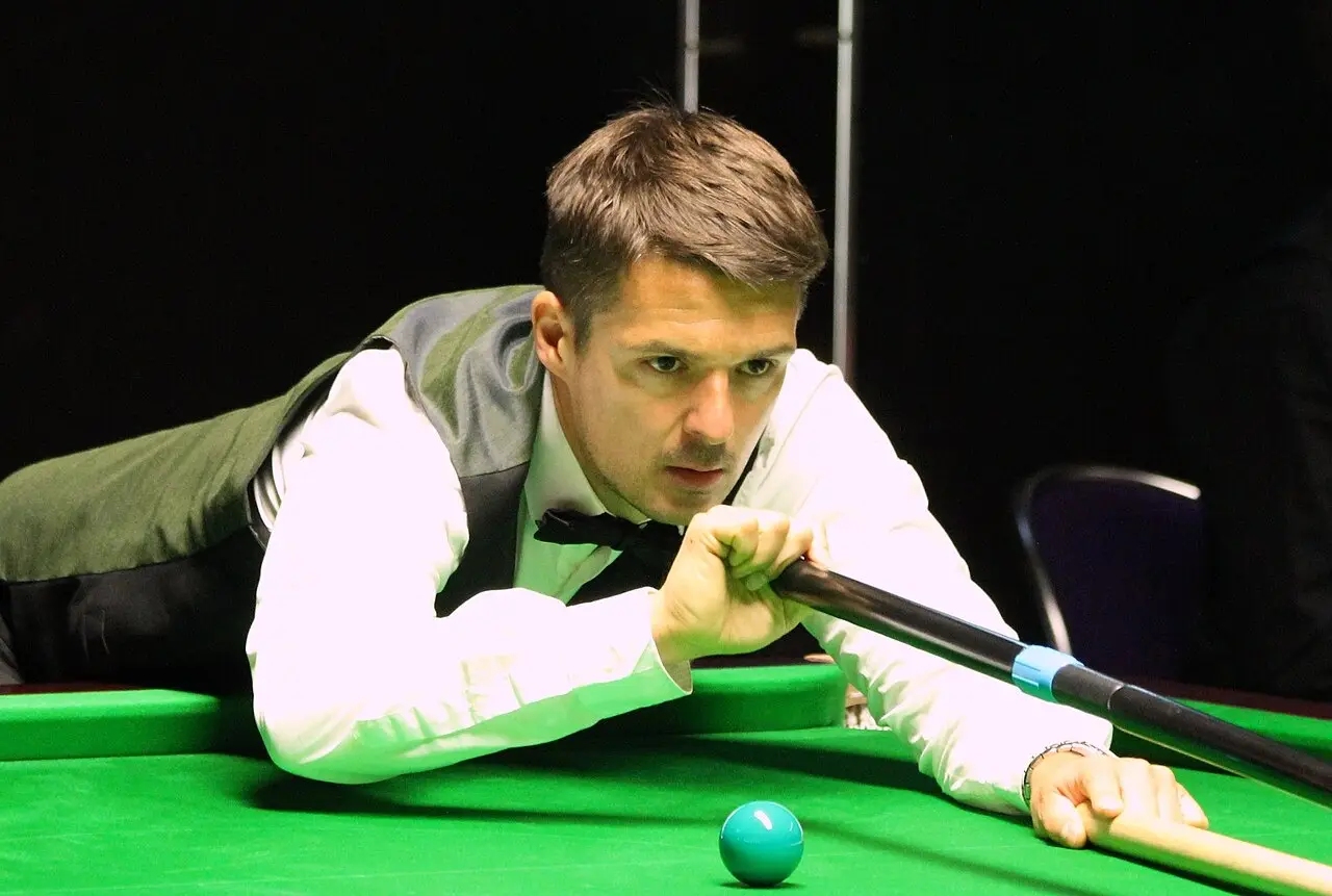 Michael Holt competing at a professional snooker event