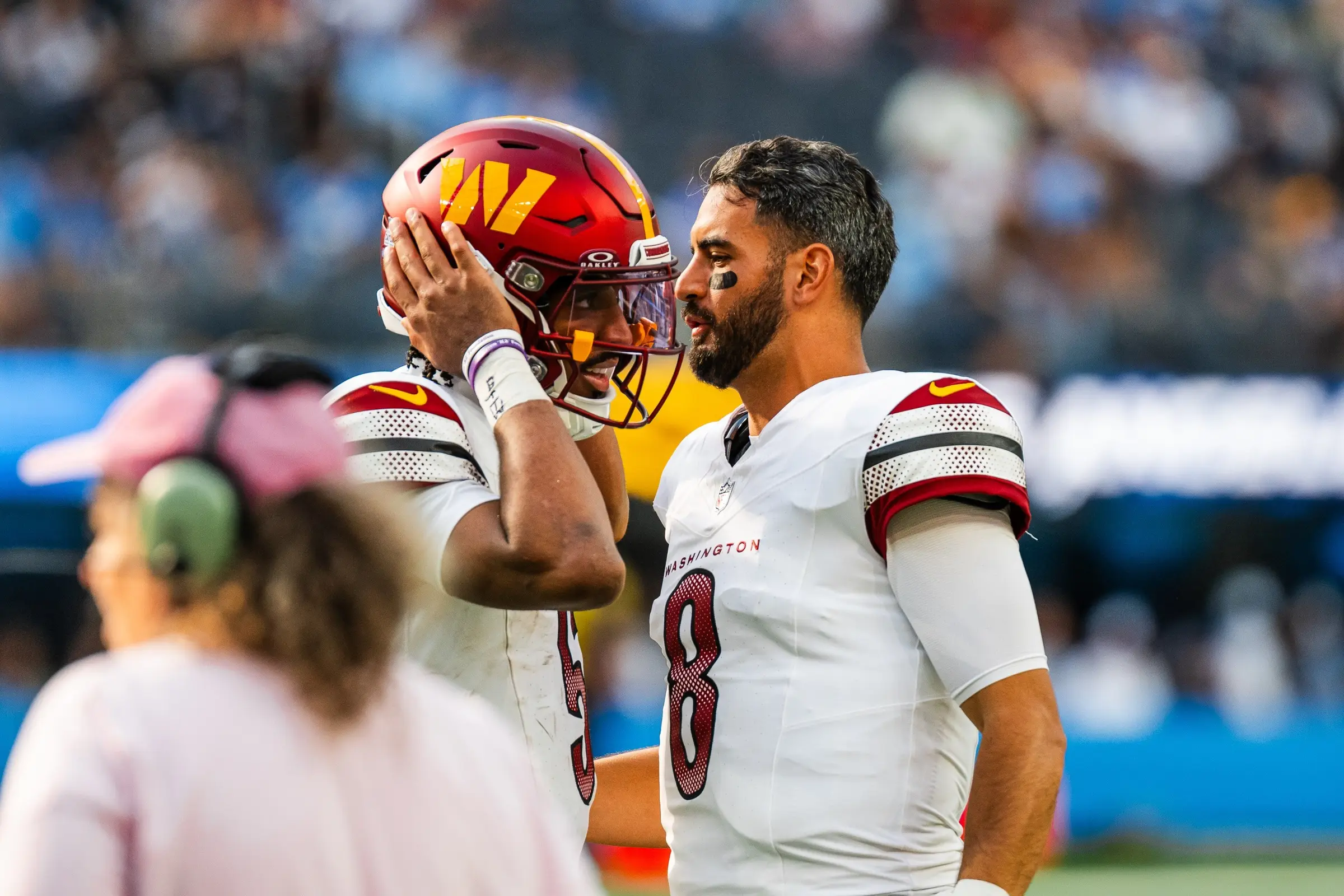 Washington Commanders quarterback Marcus Mariota on the sideline