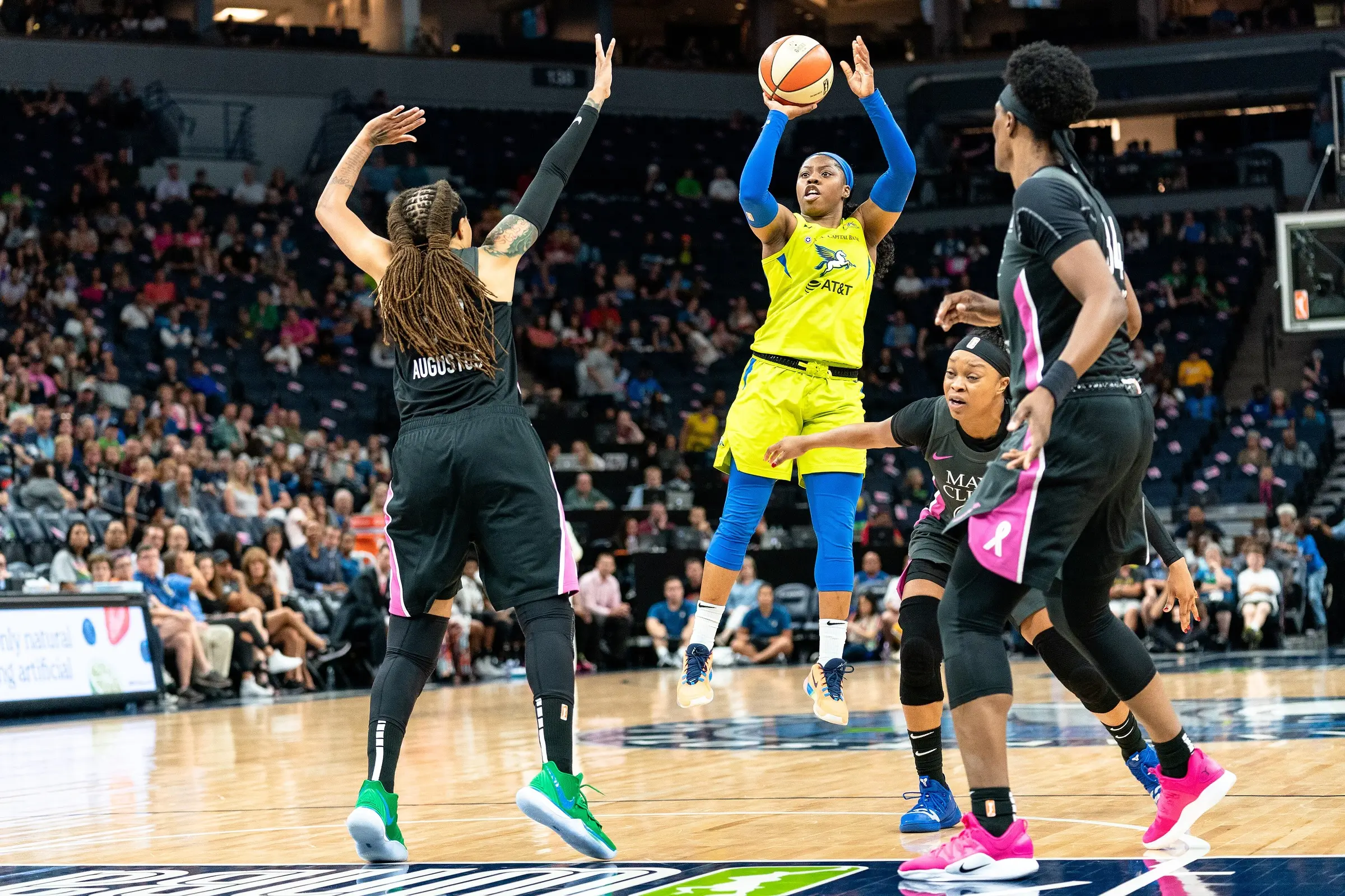 Arike Ogunbowale competing in the WNBA