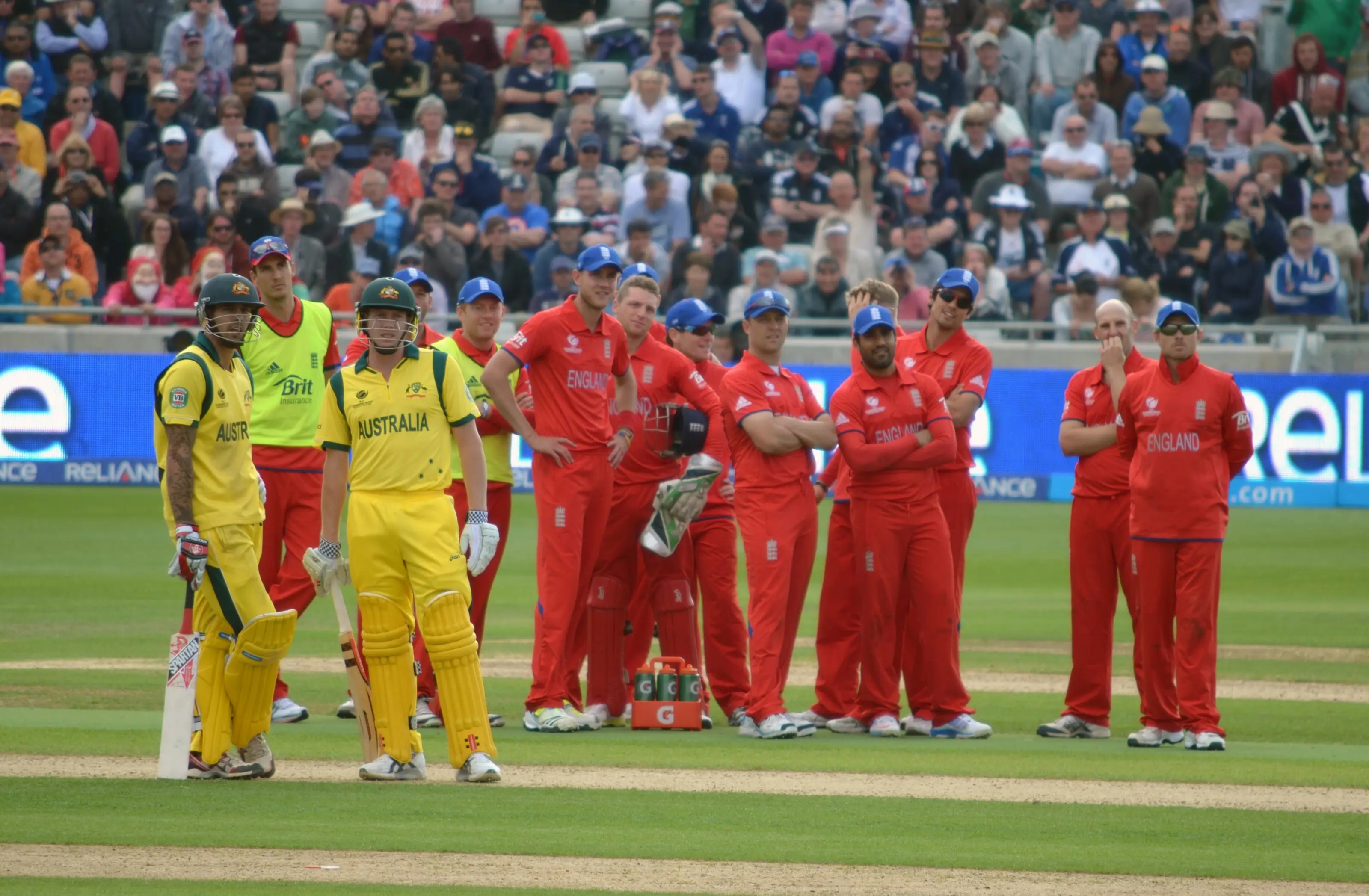 England cricket players awaiting a run-out decision against Australia