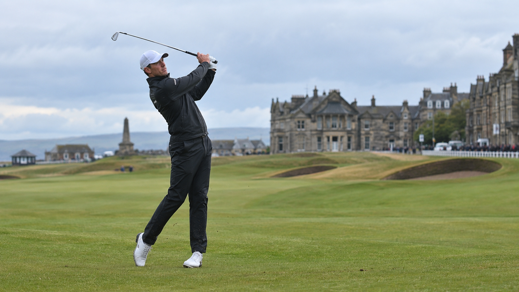 AI-generated editorial reconstruction of Adrian Meronk playing an approach shot at St Andrews