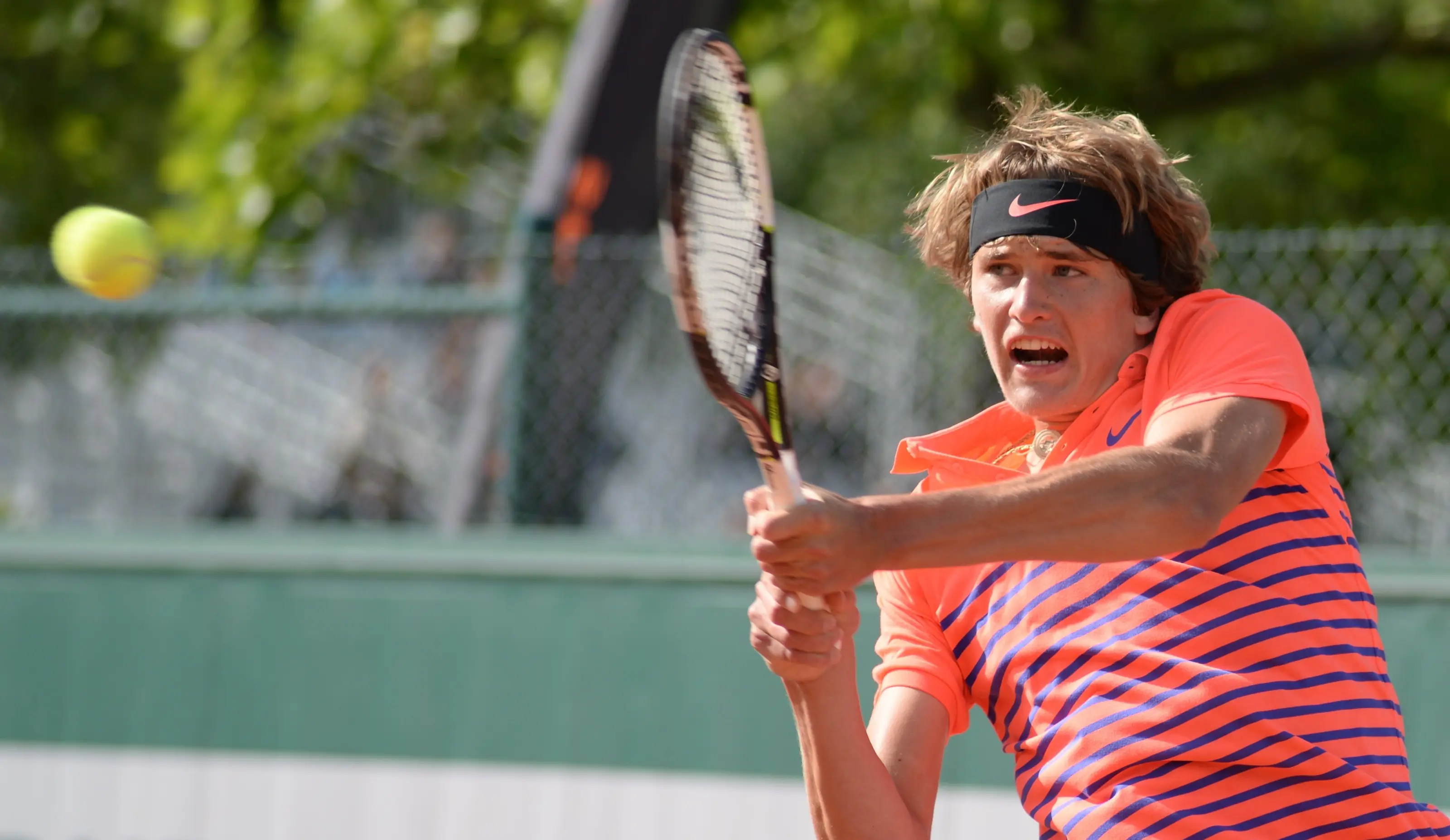 Alexander Zverev competing in a professional tennis match