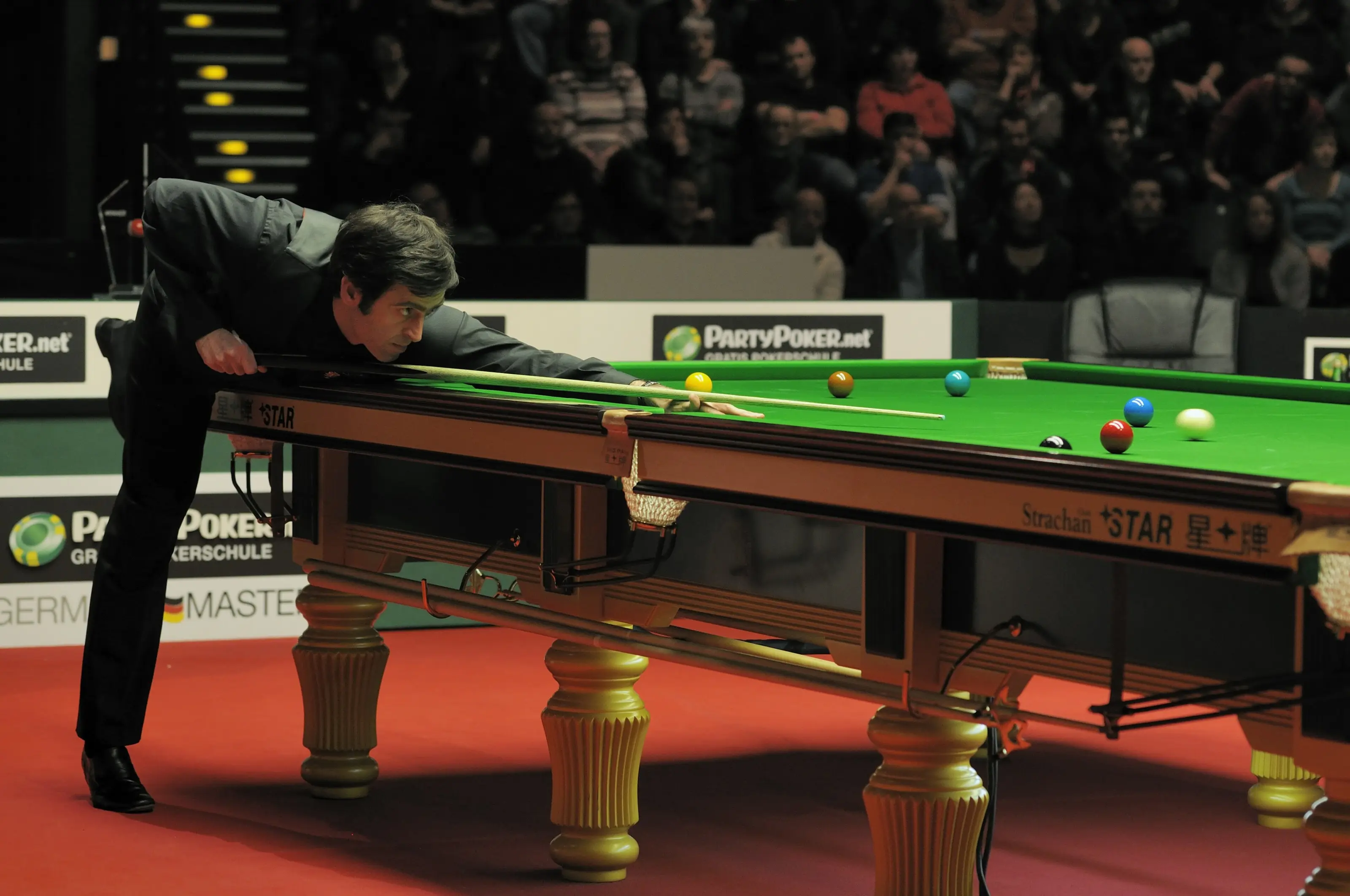 Ronnie O'Sullivan playing during a professional snooker final