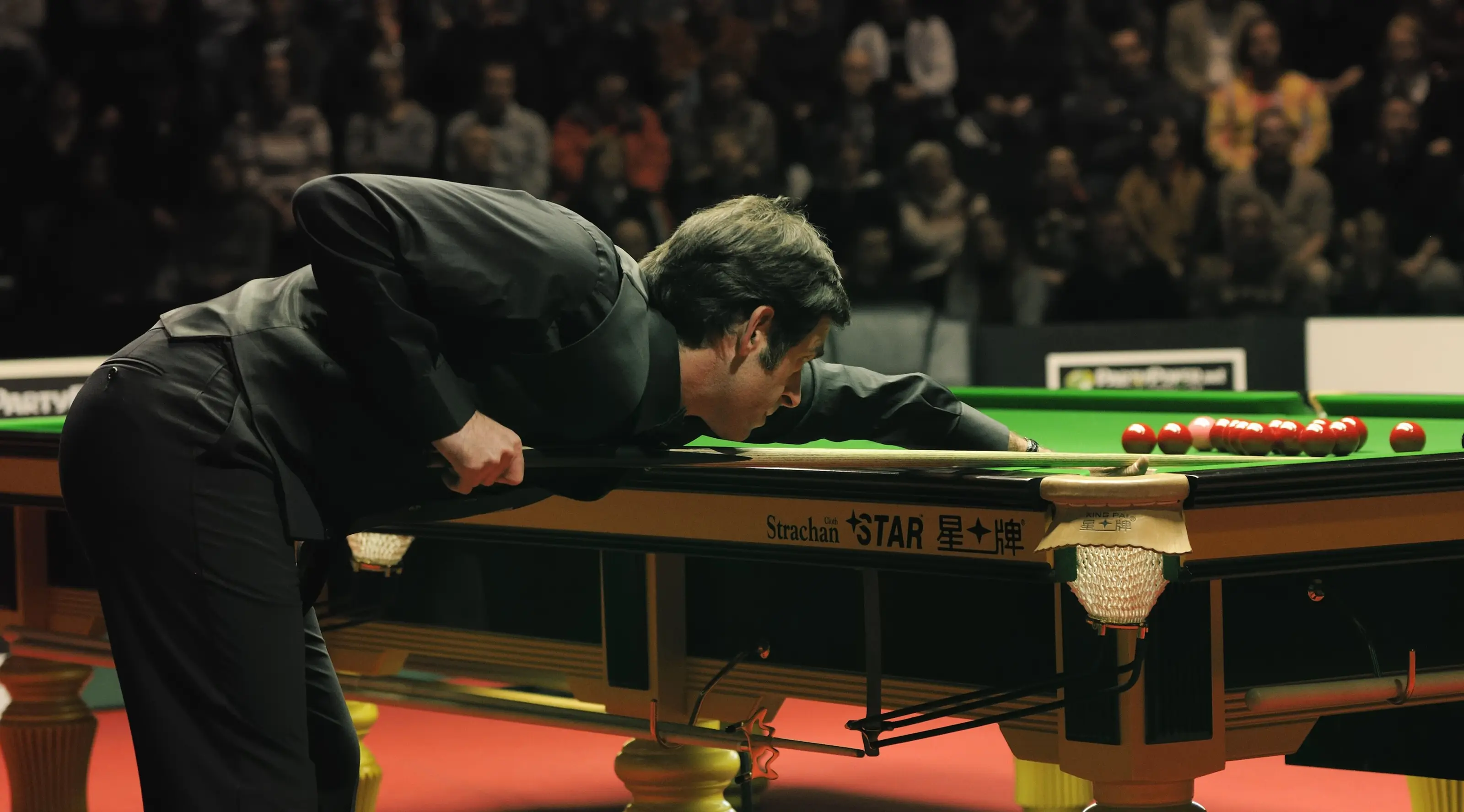 Ronnie O'Sullivan competing in the German Masters final