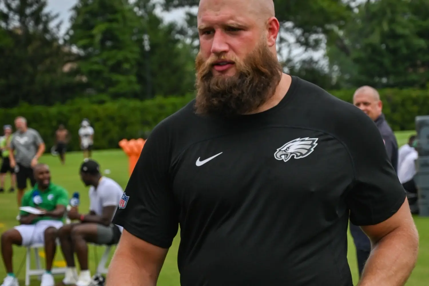 Lane Johnson walking off the field at Philadelphia Eagles training camp in 2025