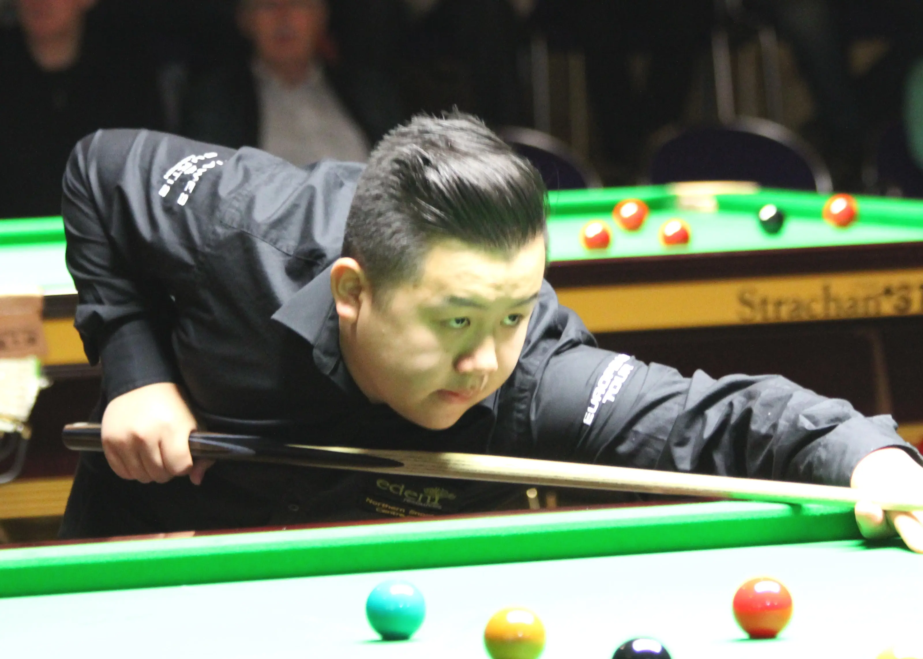 Sanderson Lam playing at the 2014 Paul Hunter Classic