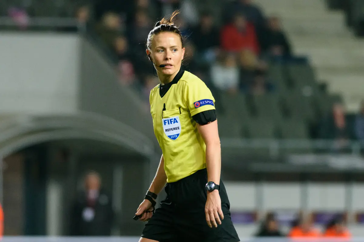 English football referee Rebecca Welch officiating a women's match in 2019