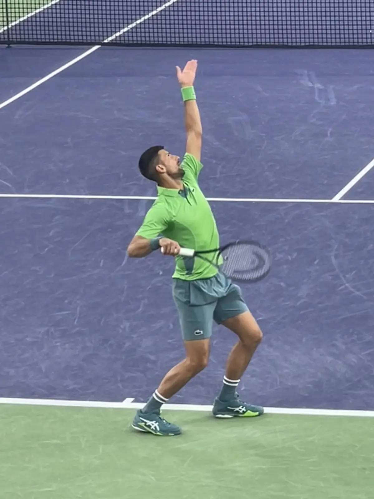 Novak Djokovic serving at Indian Wells in 2024