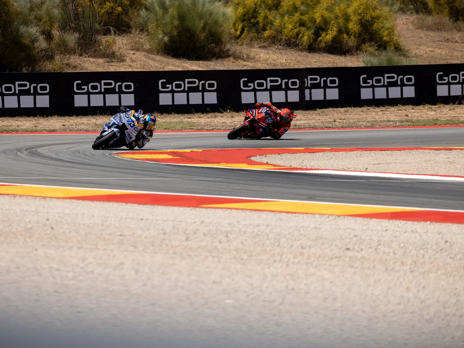 Marc Márquez riding behind Álex Márquez at the 2025 Aragón Grand Prix
