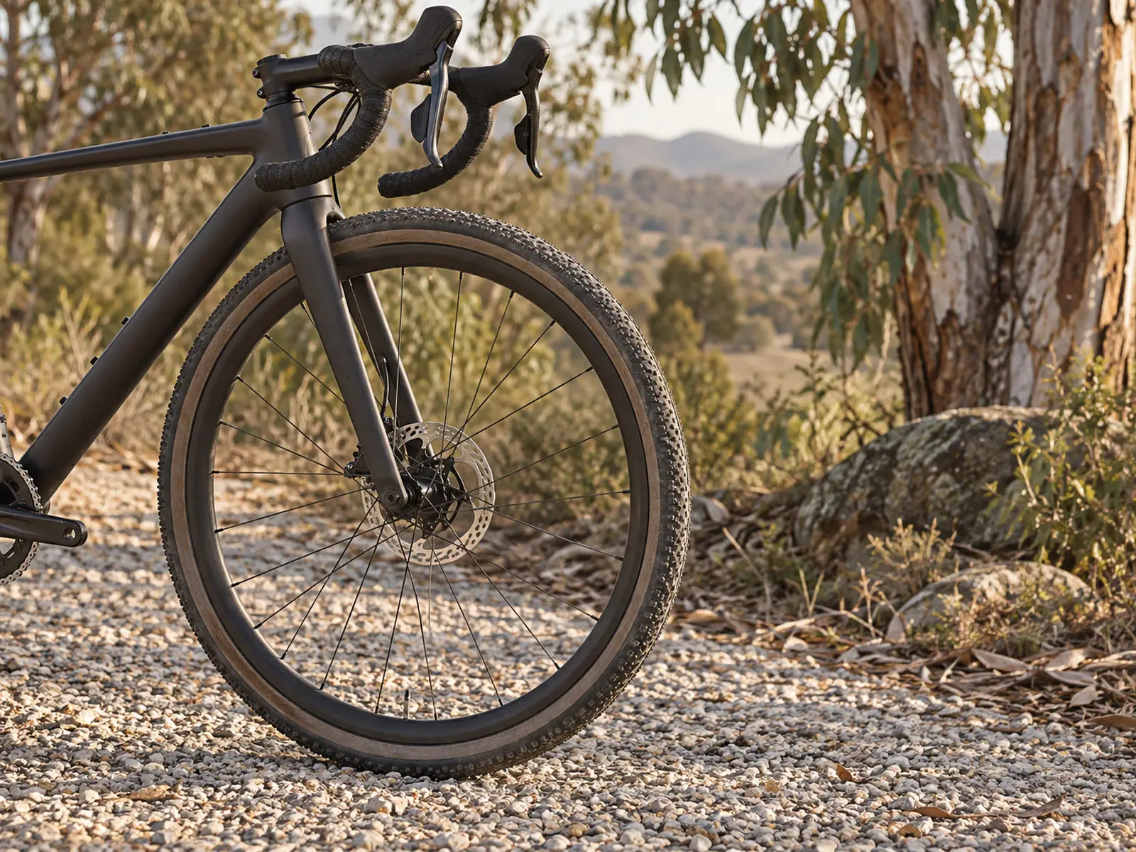 AI-generated conceptual illustration of a gravel bicycle wheel and handlebars; not Marianne Vos’s actual bicycle